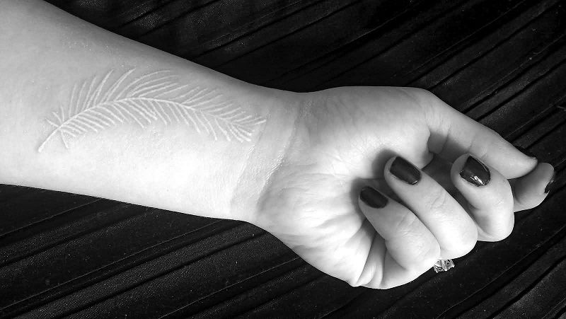 Тату Белое перо